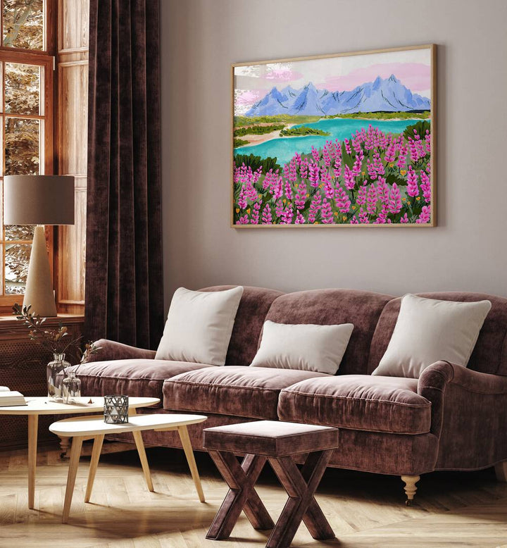 Vestrahorn By Sarah Gesek Landscape Art Prints in Oak Wood Plain Frame placed on a living room wall behind a sofa and beside a window