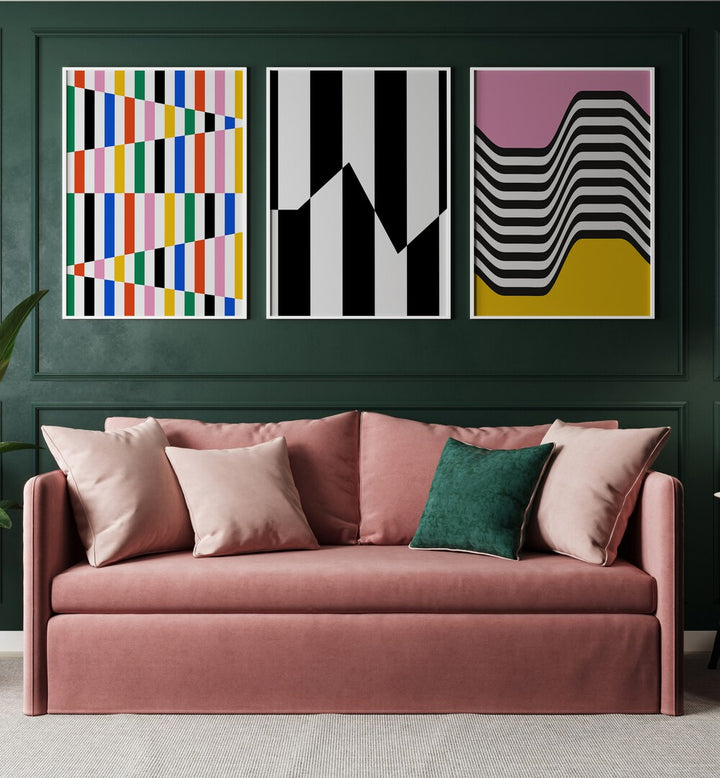 Vibrant Colors Set Set Of 3 Paintings in White Plain Frame placed on a living room wall behind a sofa