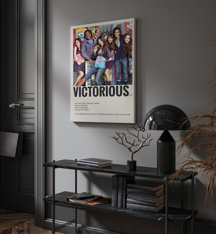 Victorious 2010 Movie Posters in Gallery Wrap placed on a wall behind a black table and beside a door