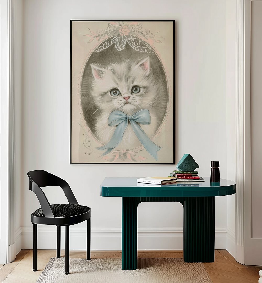 Vintage Kitten Kids Room Paintings Kids Room Wall Art in Black Plain Frame placed on a wall behind a study table