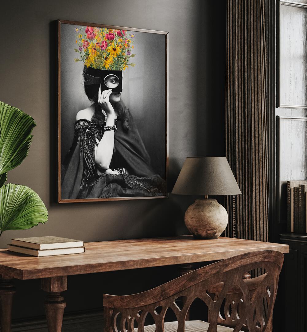 Vintage Woman With Flowers by the Art Concept Altered Art Prints in Dark Wood Plain Frame placed on a wall behind a table