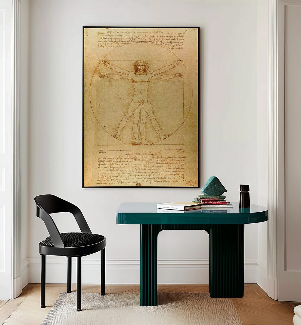 Vitruvian Man Vintage Paintings in Black Plain Frame placed on a white wall behind a study table