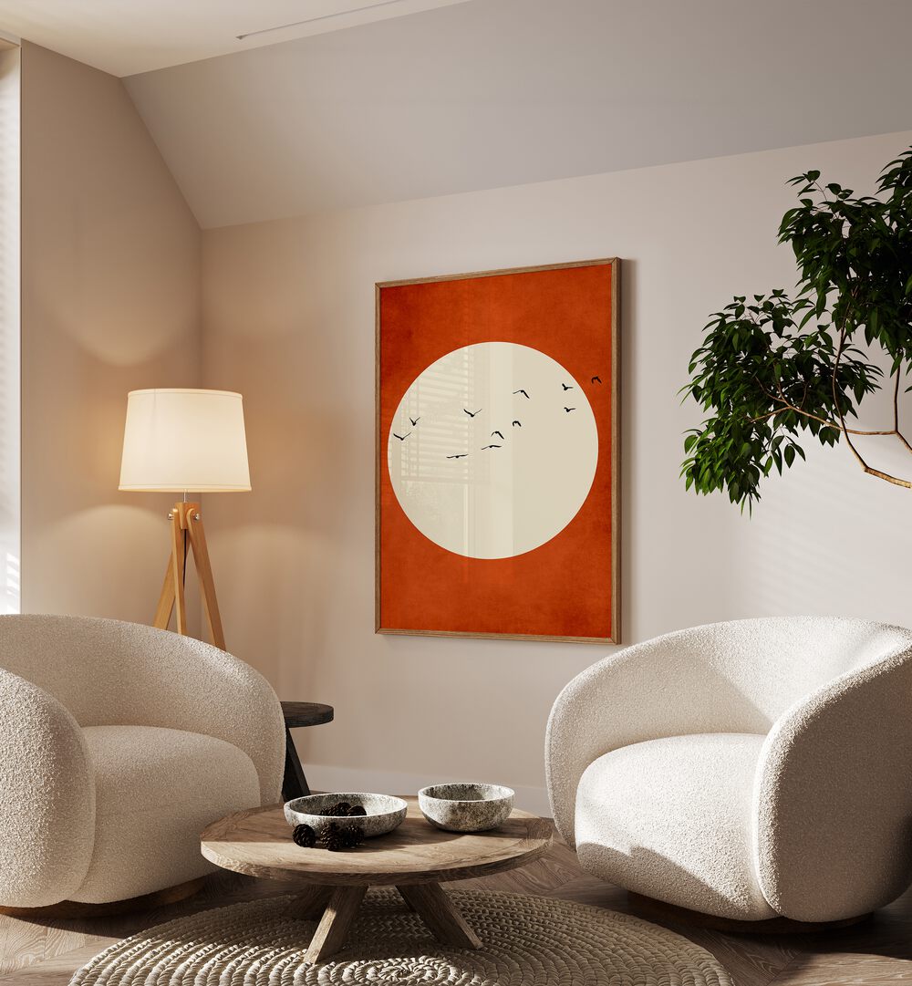 Warming Feelings Landscape Art Artwork in Oak Wood Plain Frame Placed on a Cream Colored Wall Next to a Pair of White Sofa Chairs in the Living Room