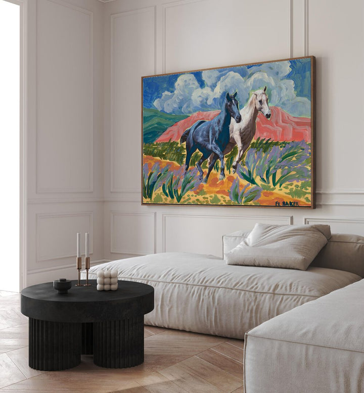 Vibrant WATCH THEM RIDE, ANIMAL PAINTINGS adorn the wall, showcasing dynamic wildlife in stunning colors.