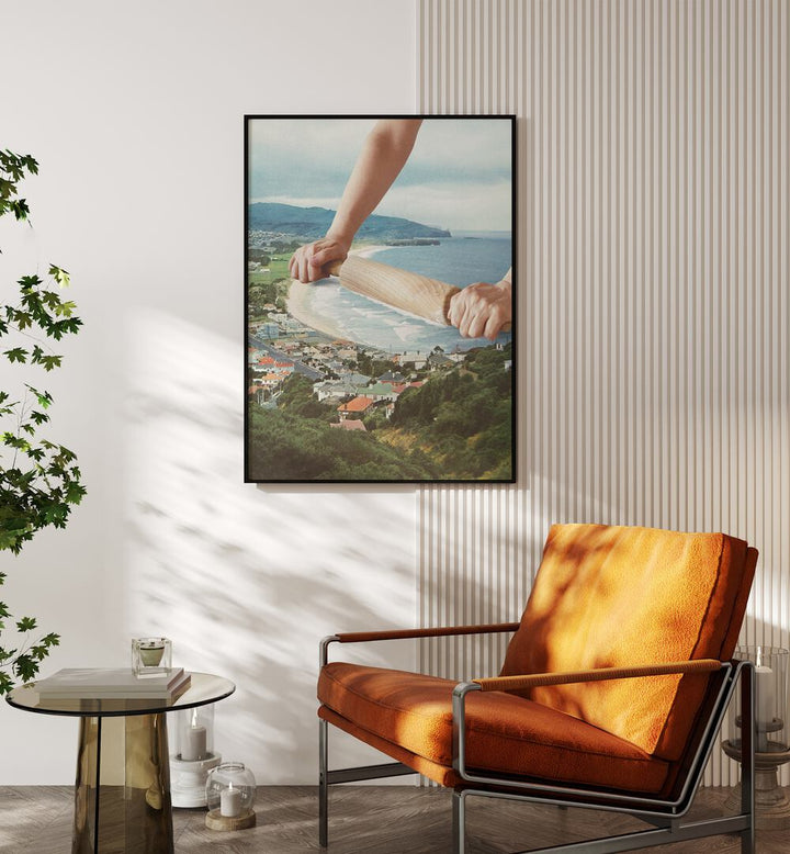 Waves Roller Surreal Art Painting Artwork in plain black frame beside an orange sofa