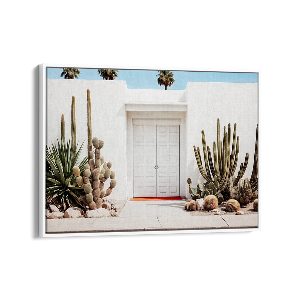 Elegant WHITE MID-CENTURY MODERN HOUSE , BEACH PAINTINGS design featuring minimalist architecture and desert plants.