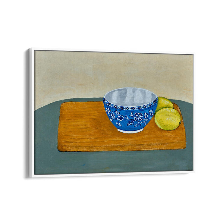 Bright blue bowl with lemons on a wooden board, perfect for LEMONS, KITCHEN POSTERS to enhance your kitchen decor.