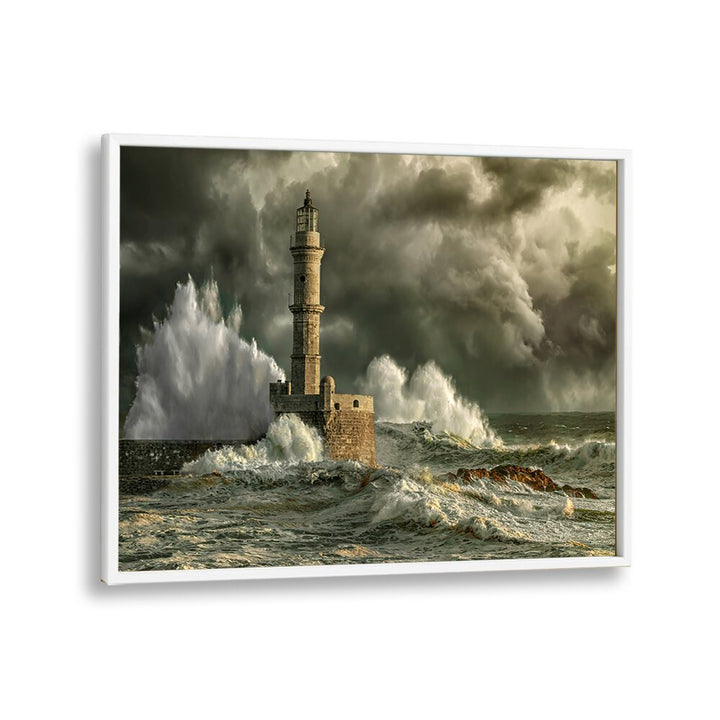 Dramatic waves crash against a lighthouse in CHANIA STORM, PHOTOGRAPHY PRINTS, capturing nature's fierce beauty.