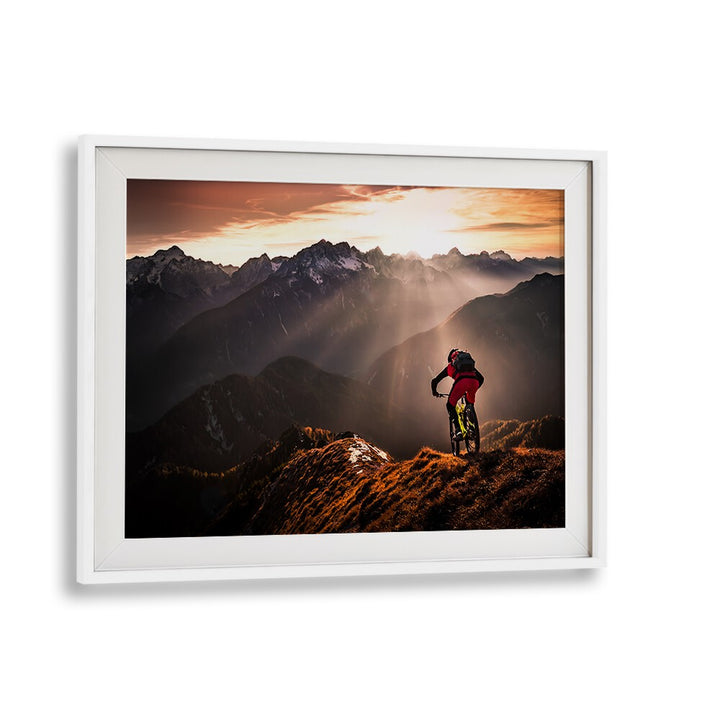 Mountain biker against a stunning sunset, showcasing dynamic movement in JUST RIDE, PHOTOGRAPHY PRINTS.