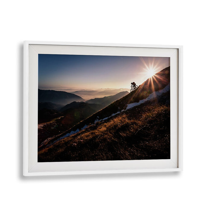 LAST RAYS, PHOTOGRAPHY PRINTS showcase a cyclist against a stunning sunset, blending action and fine art beautifully.