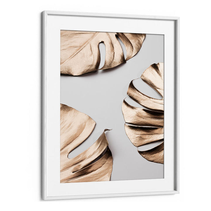 Stylish MONSTERA GOLD I, FASHION POSTERS featuring elegant gold leaves, perfect for elevating modern decor.