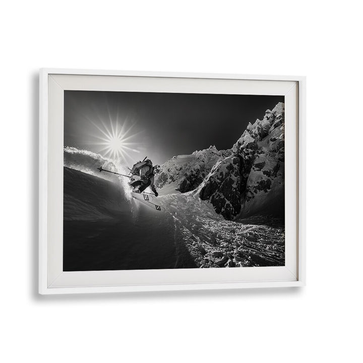 Dynamic skiing action captured in SNOW SPLASH OVER THE EDGE, PHOTOGRAPHY PRINTS for thrill-seekers and art lovers.