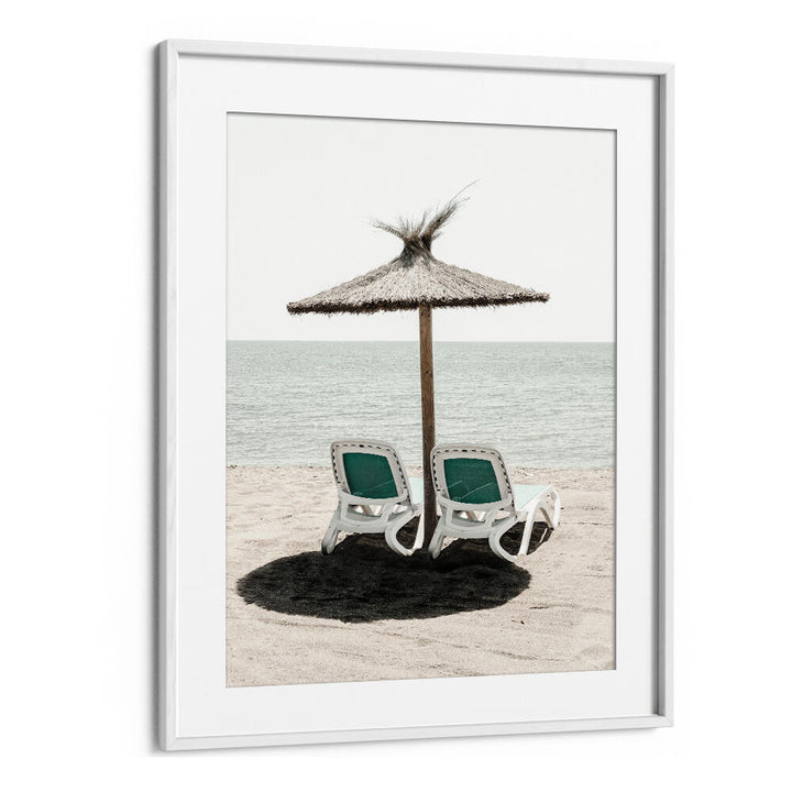 Relaxing scene with beach chairs and an umbrella, showcasing SOLARIS II, BEACH PAINTINGS for a serene coastal vibe.