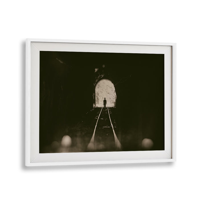 Explore the captivating moment in TOWARDS THE LIGHT, PHOTOGRAPHY PRINTS, showcasing urban life through dramatic shadows.