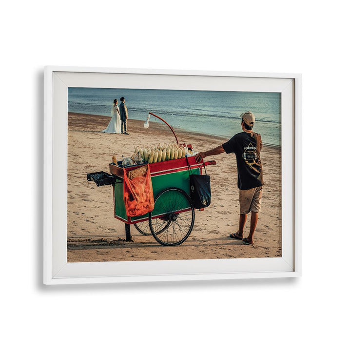 Capture the joy of love with JUST MARRIED, PHOTOGRAPHY PRINTS featuring a couple on the beach and a local vendor.