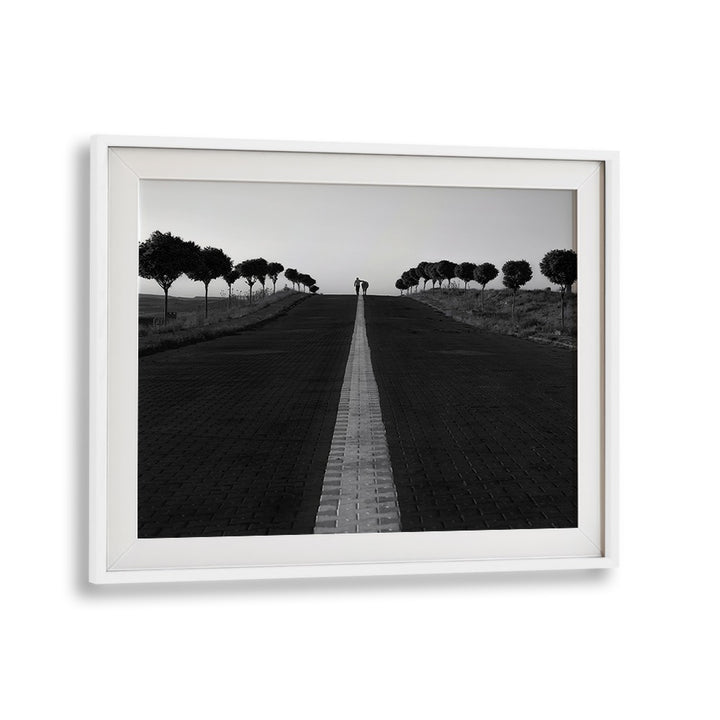 Captivating street scene in black and white, featuring "GOING HOME, PHOTOGRAPHY PRINTS" for urban life enthusiasts.