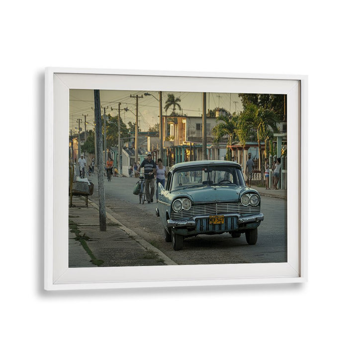 Vintage urban scene featuring a classic car, perfect for STREET LIFE, PHOTOGRAPHY PRINTS enthusiasts.