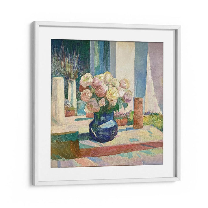 Stunning roses in a blue vase create an elegant centerpiece for vibrant home decor. Perfect for any setting.