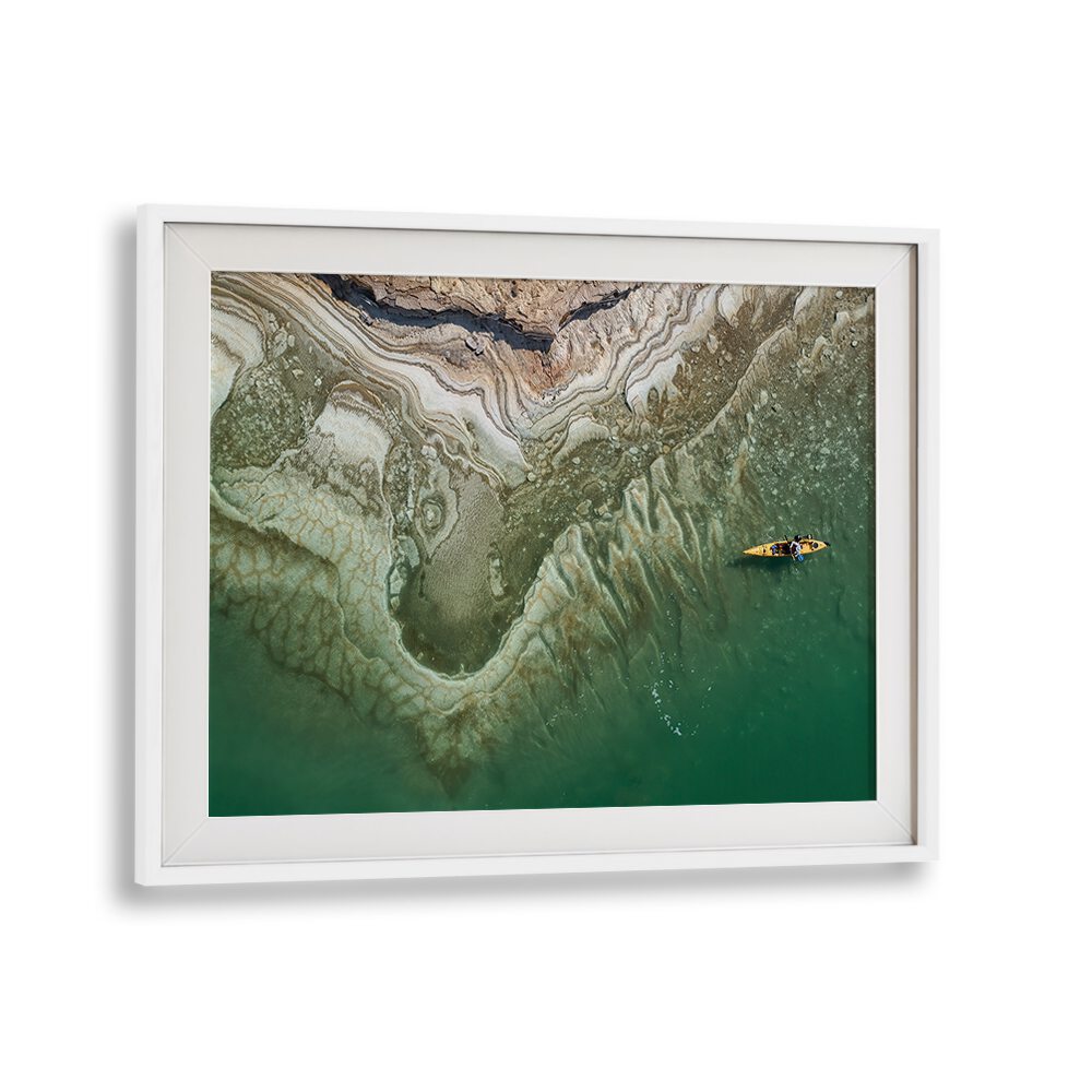 Explore the breathtaking DEAD SEA KAYAKER, PHOTOGRAPHY PRINTS, showcasing a kayaker amid stunning landscapes.