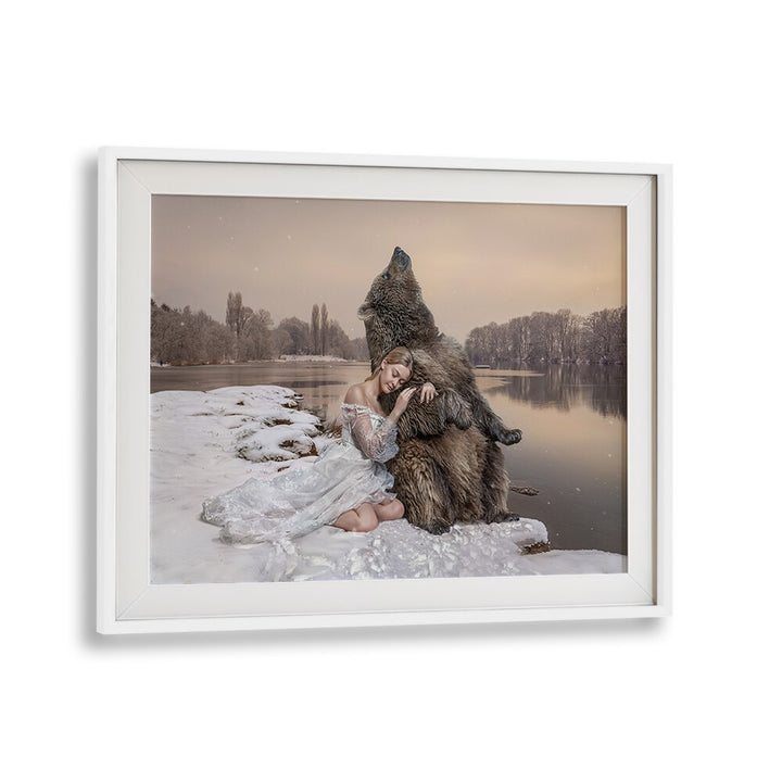 CUDDLING BEAR, PHOTOGRAPHY PRINTS feature a whimsical bear embracing a woman in a serene snowy landscape.