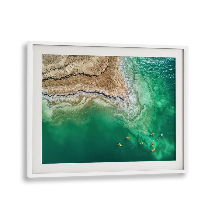 Stunning view of vibrant kayakers on the Dead Sea, featured in our DEAD SEA EXPLORATION, PHOTOGRAPHY PRINTS collection.
