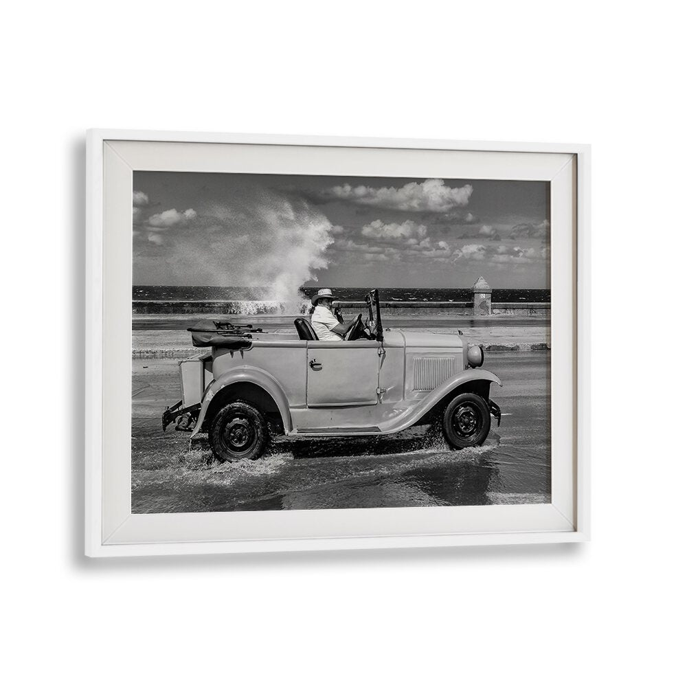 Classic vehicle splashes through waves, capturing urban essence in MALECON, PHOTOGRAPHY PRINTS for timeless art.