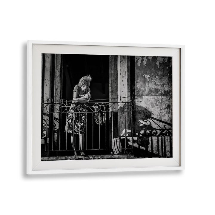 Elegant HABANA STREET VI, PHOTOGRAPHY PRINTS showcasing urban life captured on a balcony, reflecting vibrant street moments.