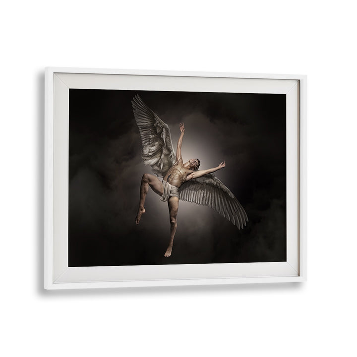 Surreal FALLEN IKARUS, PHOTOGRAPHY PRINTS showcasing a winged figure amidst dramatic clouds, perfect for any space.