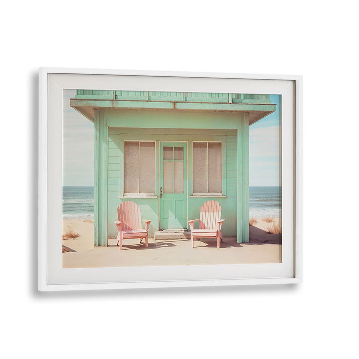 Charming beach house with pastel hues and pink chairs, showcasing PASTEL PERSPECTIVES, BEACH PAINTINGS by Philippe Hugonnard.