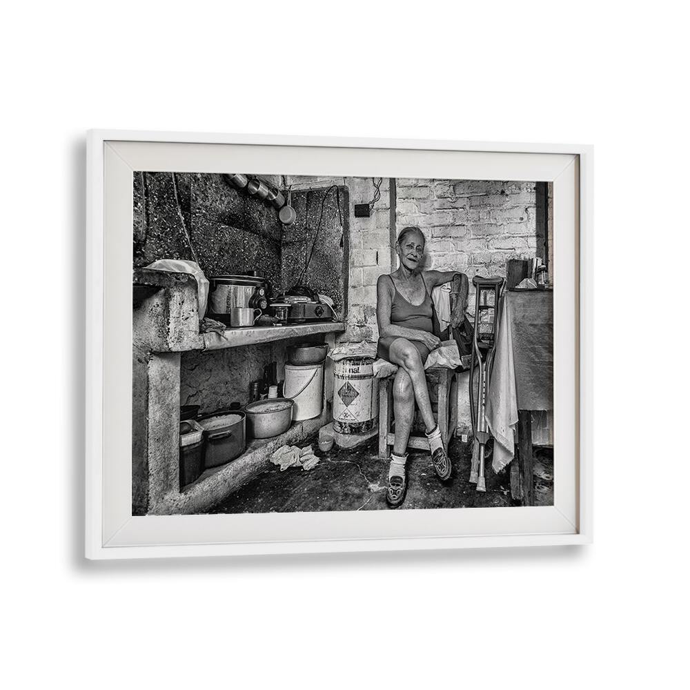 Vibrant urban scene featuring a woman in her kitchen, part of MARIA, PHOTOGRAPHY PRINTS collection.