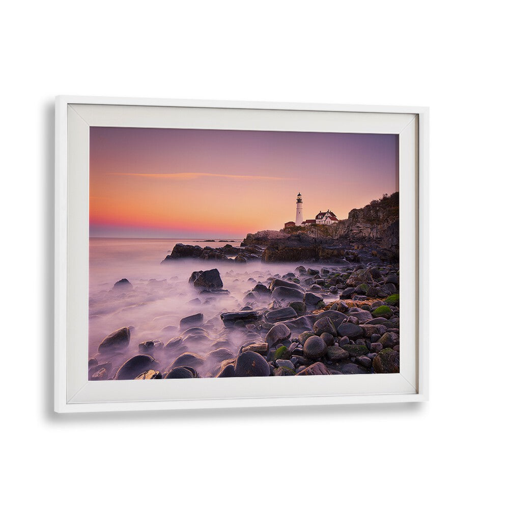 Stunning Portland Headlight photography prints showcasing the iconic lighthouse against a vibrant coastal sunset.