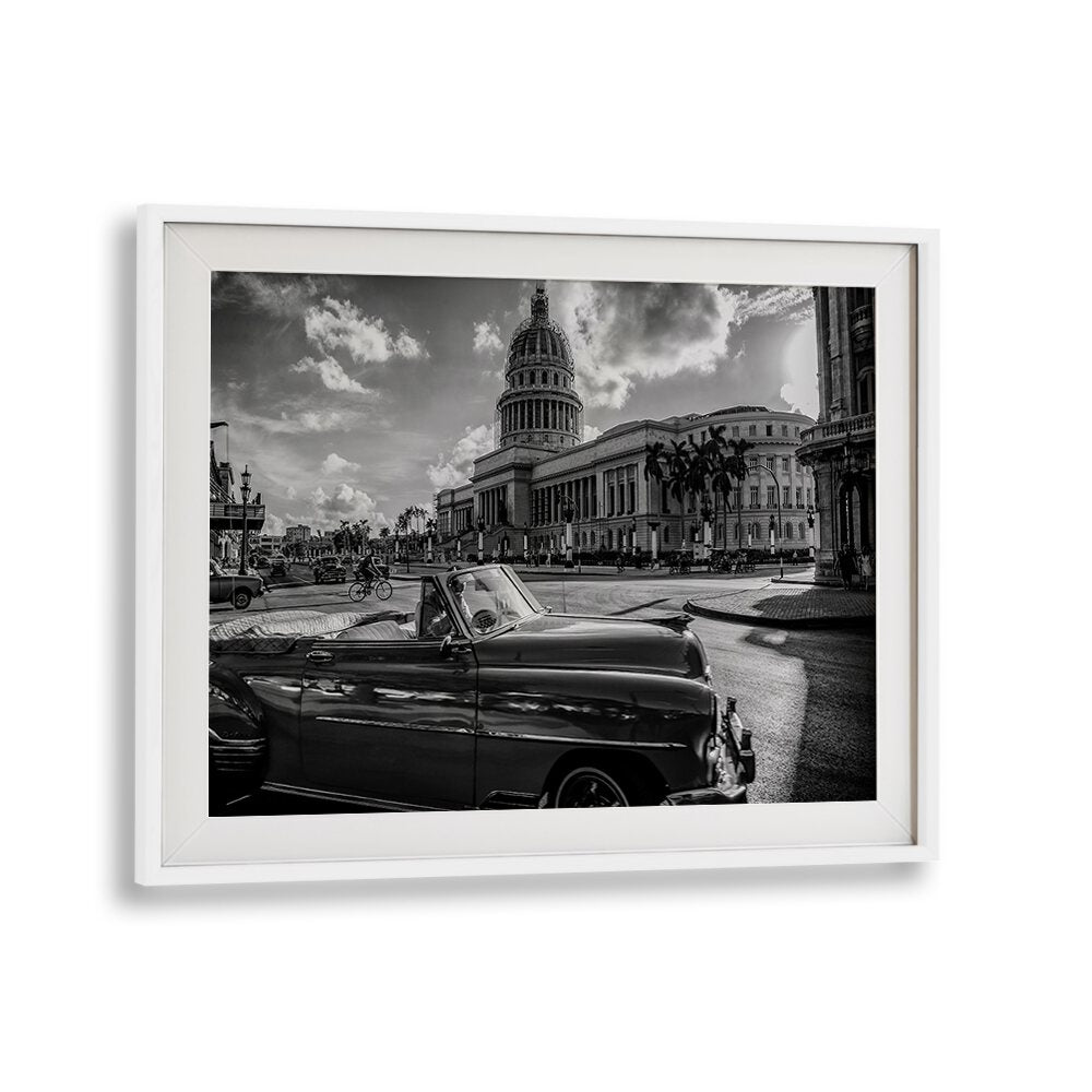 Stunning black and white scene featuring EL CAPITOLIO, PHOTOGRAPHY PRINTS, showcasing urban life and classic cars.