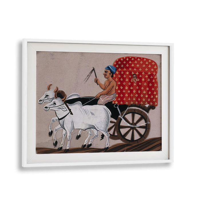 A MAN DRIVING A BULLOCK