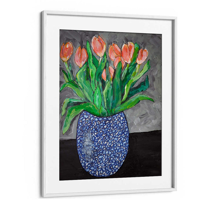 Vibrant tulips in a blue vase showcased in "TULIPS IN BLUE VASE I, FLORAL FLOWER PAINTINGS" for serene decor.