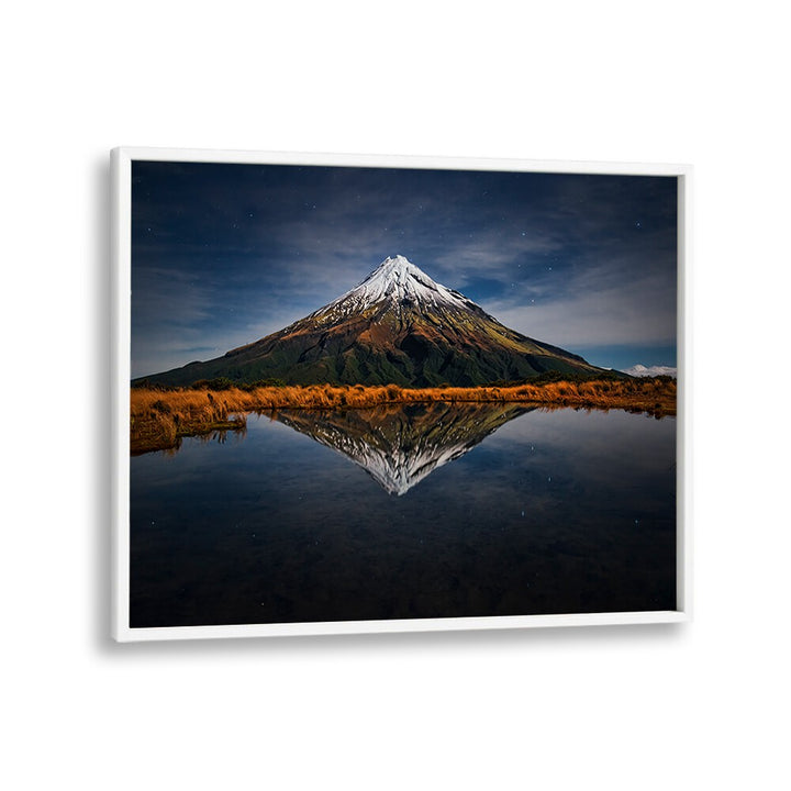 Breathtaking MOUNT TARANAKI - A STARRY NIGHT, PHOTOGRAPHY PRINTS reflecting under a starlit sky, perfect for any decor.