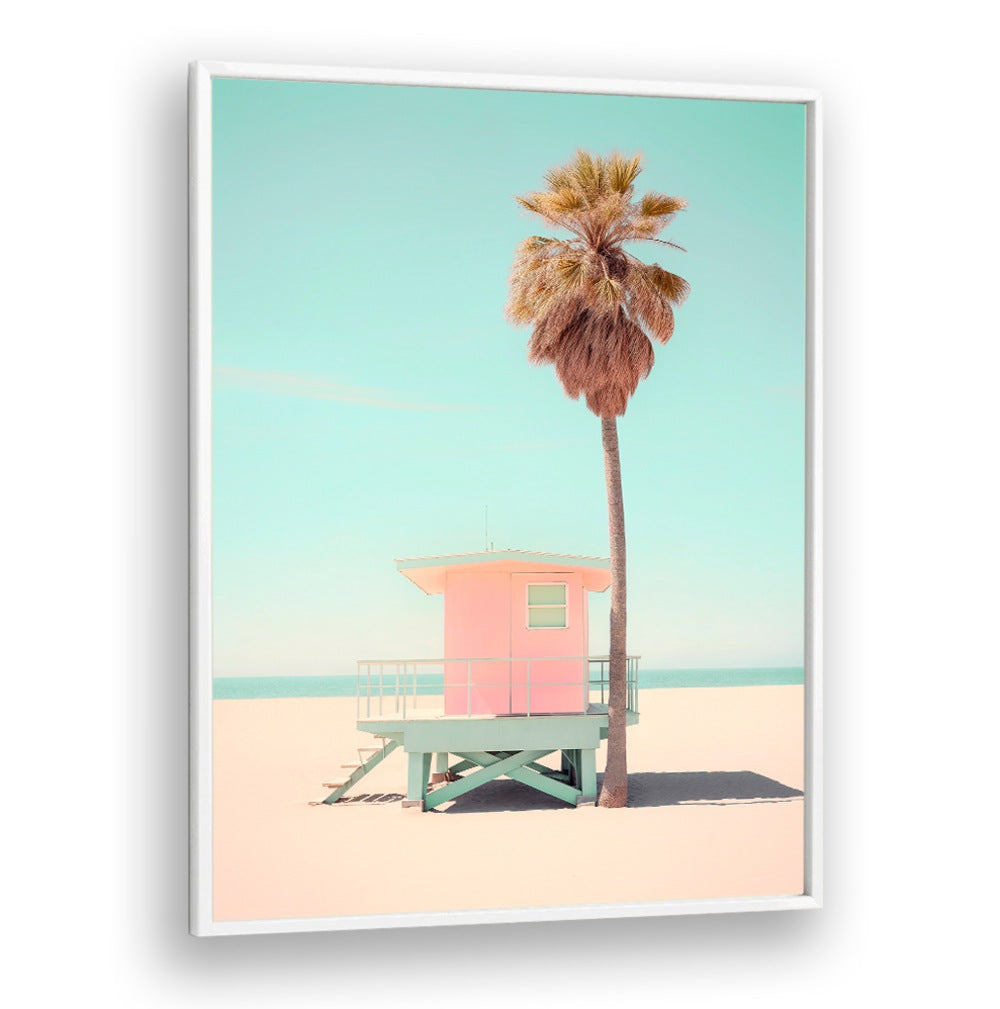 BEACHSIDE PINK BLISS, BEACH PAINTINGS showcase a pastel beach scene with a vibrant pink lifeguard tower and palm tree.