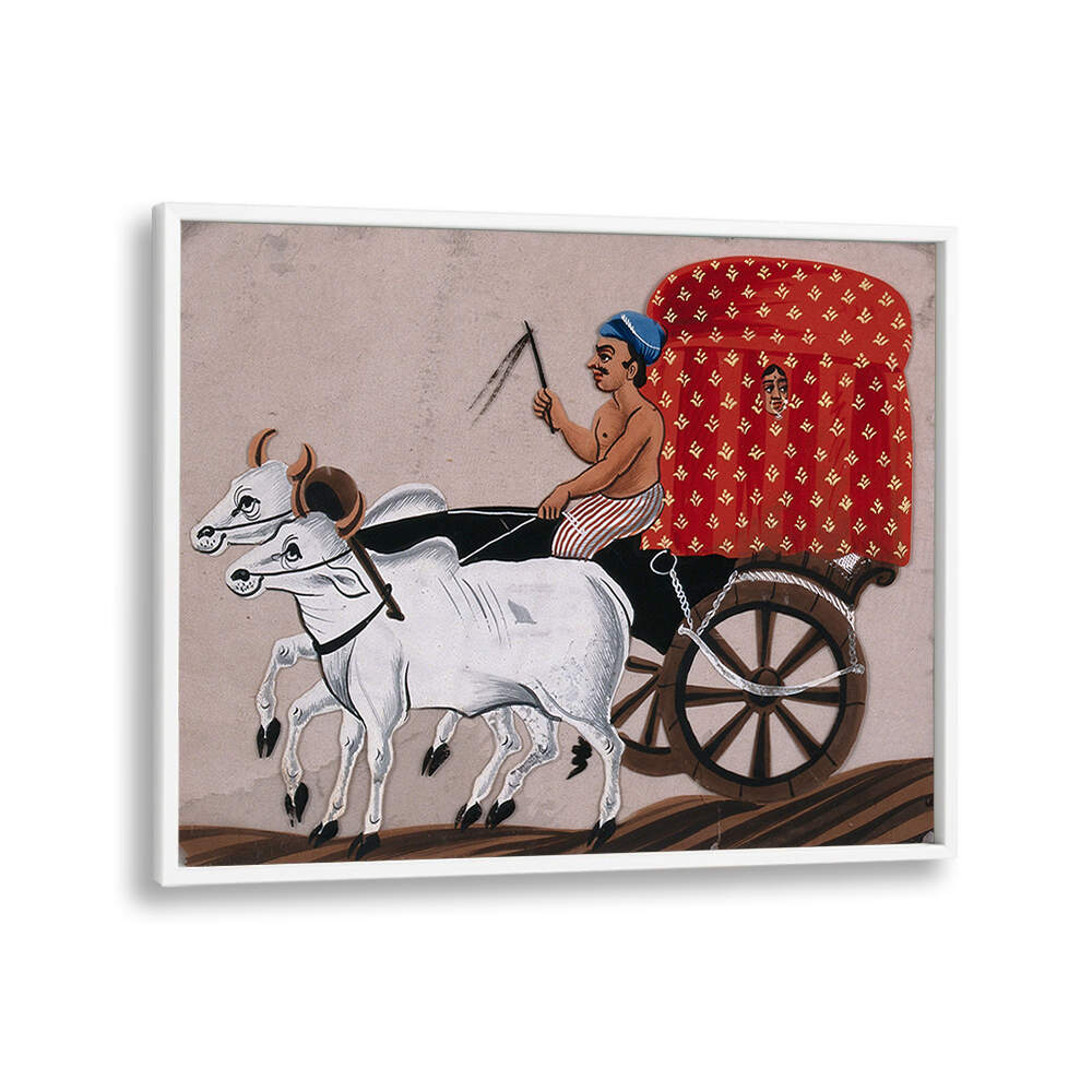 A MAN DRIVING A BULLOCK