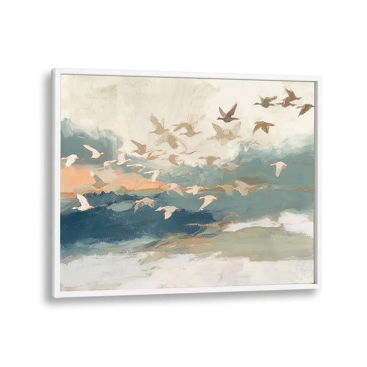 BIRDS IN FLIGHT AT DUSK OVER OPEN WATER