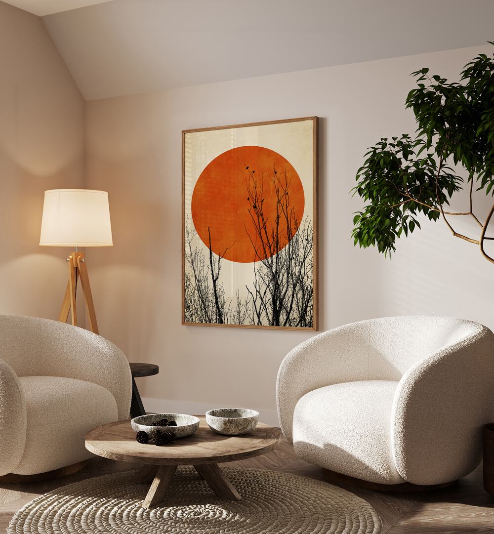 Winter Glow By Kubistika Landscape Art Artwork in Oak Wood Plain Frame on a Cream Colored Wall near White Sofa Chairs in the Living Room 