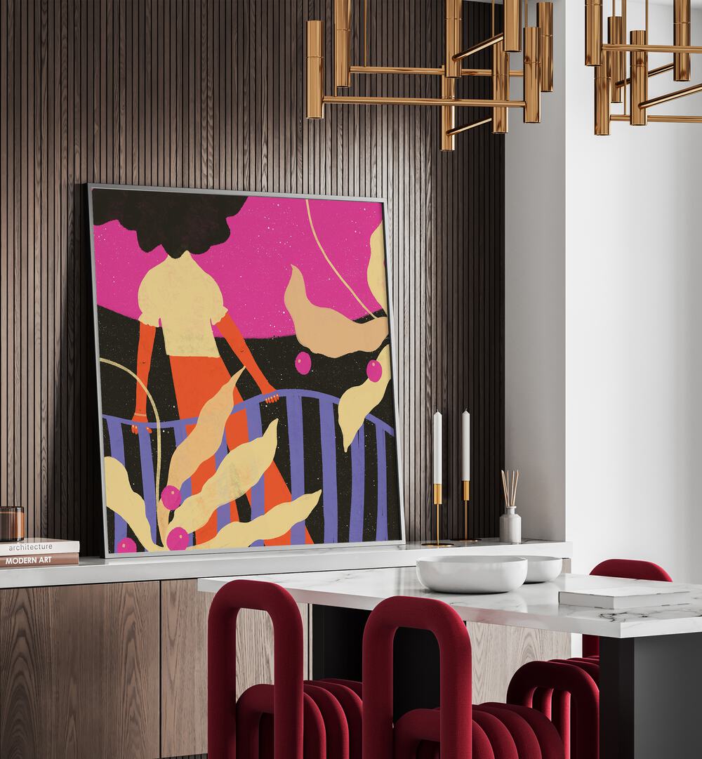 Waiting by Shriya Bhattacharya Art Prints in Black Plain Frame on a console table behind a dining table