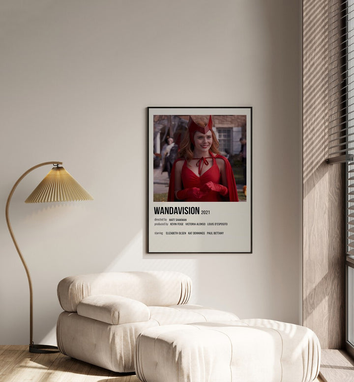 Wandavision Movie Posters in Black Plain Frame placed on a white wall beside a window and behind a sofa