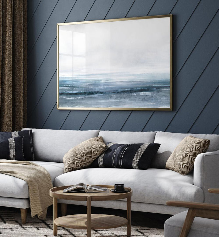 Water By Dan Hobday Abstract Art Abstract Paintings in Gold Plain Frame placed on a Blue Colored Wall near a Light Grey Sofa in the Living Room