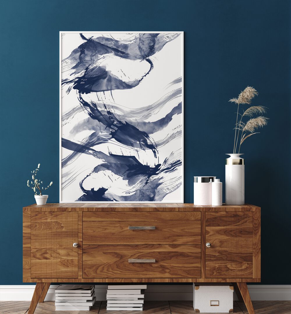 Wave Wander II Beach Prints in White Plain Frame placed on a Console Table near a Blue Colored Wall