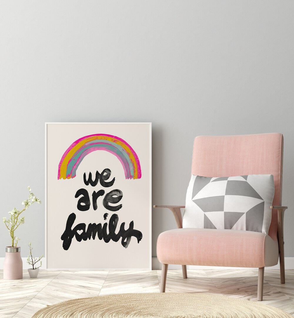 We Are Family By Treechild Kids Room Paintings in White Plain Frame placed on the floor near a Grey Colored Wall in the Drawing Room