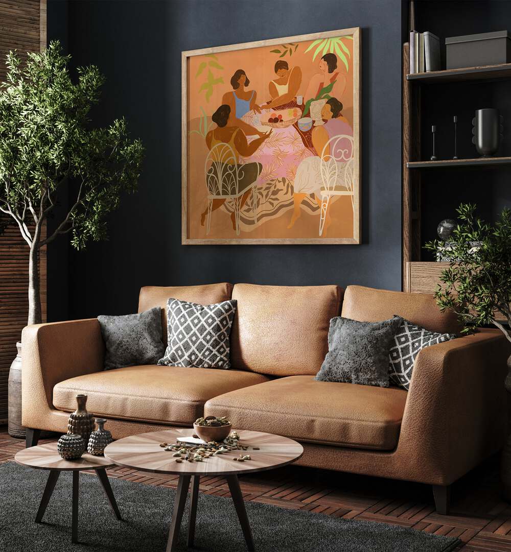 We Meet Again By Arty Guava Wall Art Prints in Oak Wood Plain Frame placed on a Blue Colored Wall near a Brown Sofa in the Living Room