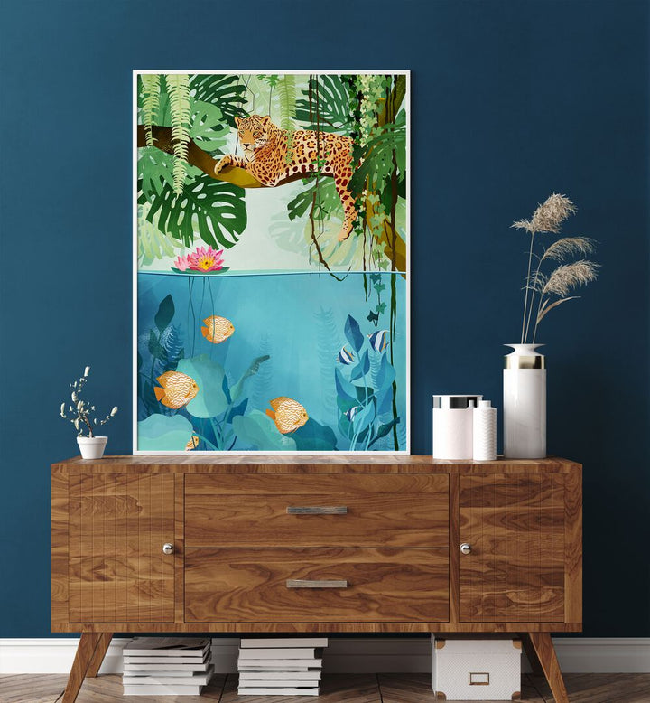 Welcome To The Jungle By Goed Blauw Kids Room Art Prints in White Plain Frame placed on a Console Table near a Blue Colored Wall in the Drawing Room