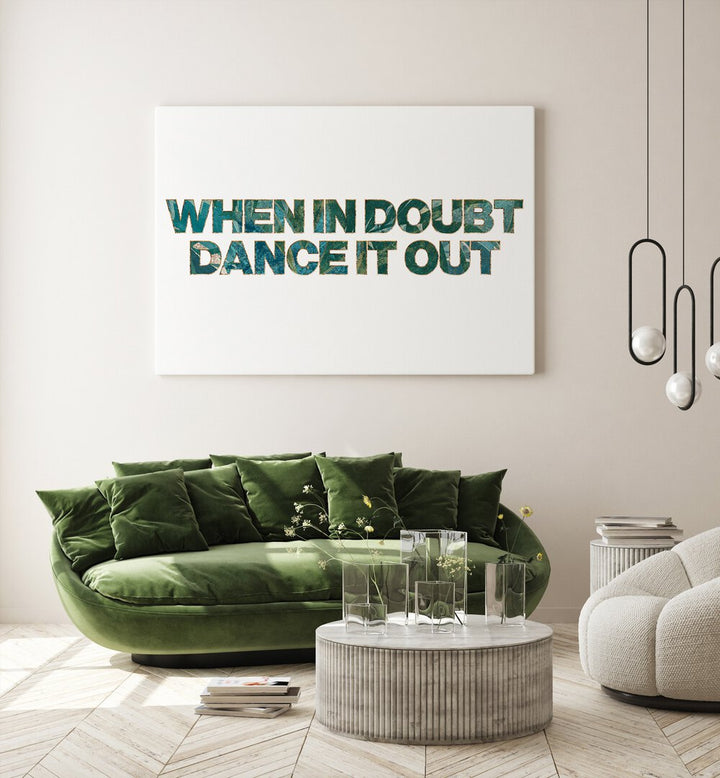 When In Doubt Dance It Out By Sarah Manovski Quotes and Typography Poster in Gallery Wrap placed on a wall behind a green sofa 