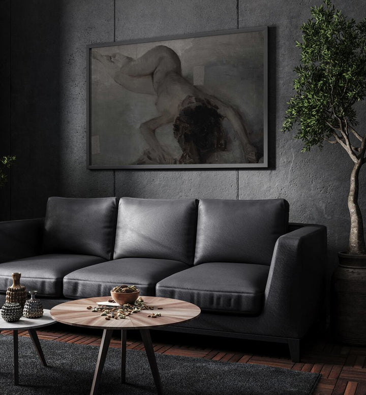 Whispers In White Gothic Wall Art Prints in Black Plain Frame hanging on a wall above black leather couch beside a plant.