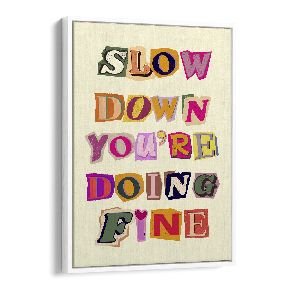 Colorful wall art featuring the phrase "SLOW DOWN YOU'RE DOING FINE" in a stylish design for home decor.