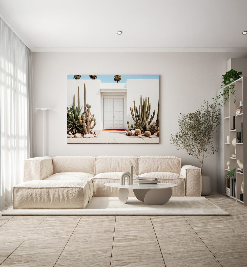 Stylish white mid-century modern house with beach paintings, perfect for enhancing contemporary living spaces.